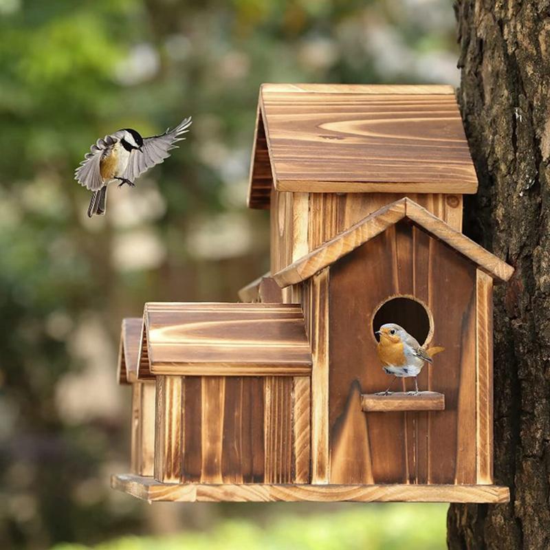 Decorazione creativa del giardino della casa degli uccelli in legno fatta a mano